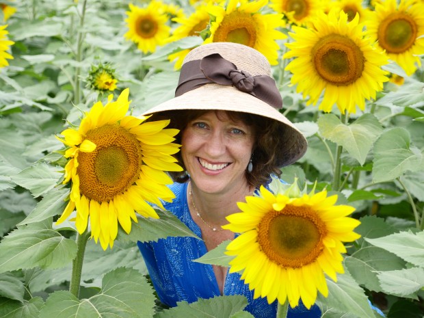 Laura Sassi with Sunflowers